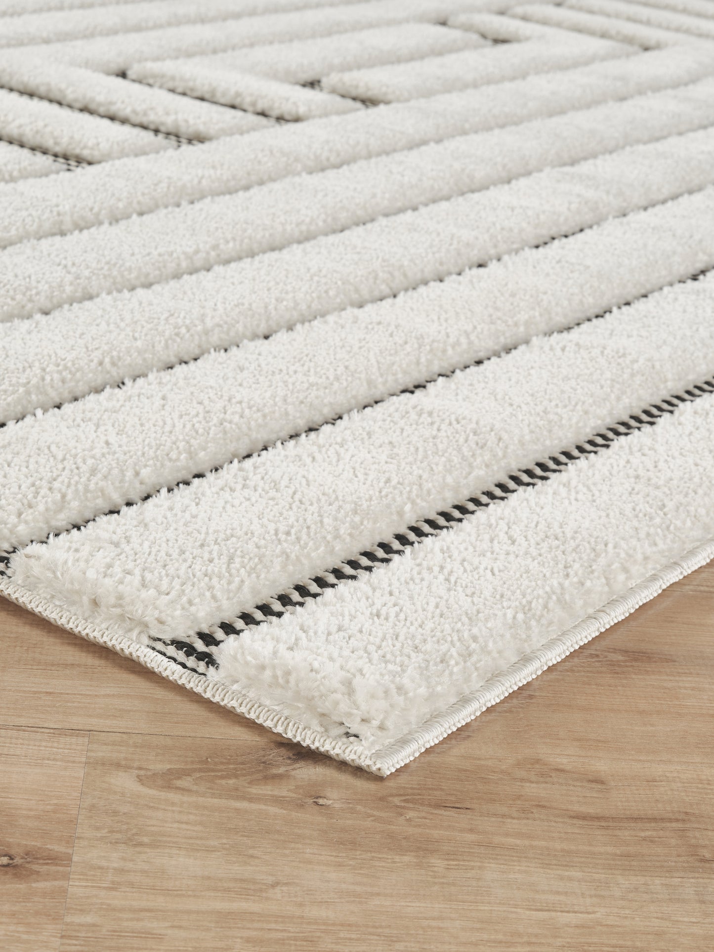 Cream Freya Merge embossed geometric rug, side profile