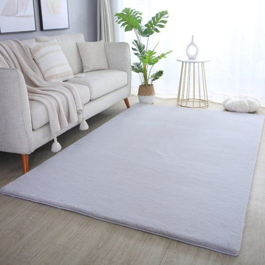 Grey Plushtale washable fluffy rug, in a room setting