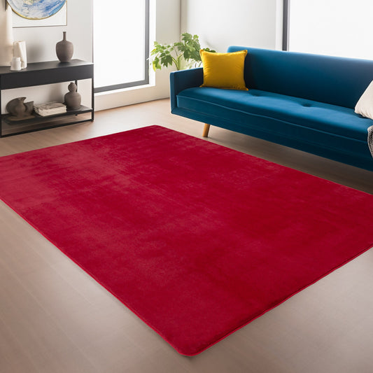 Red Snuggly washable rug, in a room setting