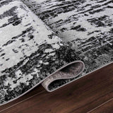 Serenity Abstract Abrasion Rug - Black