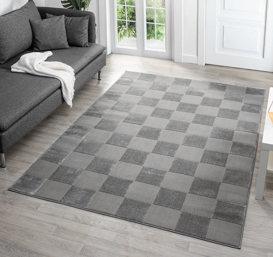 Grey Vellure Grid textured geometric rug, in a room setting