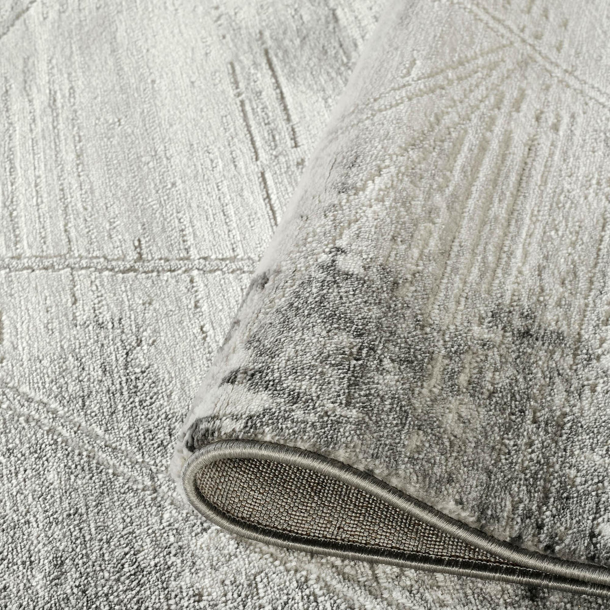 Grey Novu Mirage abstract rug, styled view 4