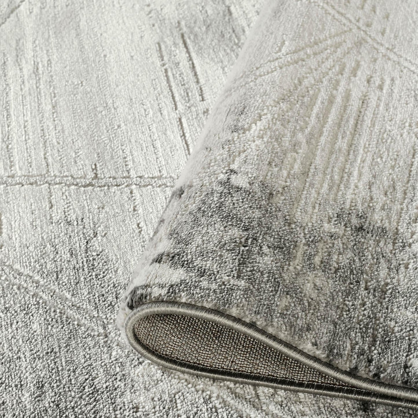 Grey Novu Mirage abstract rug, styled view 4
