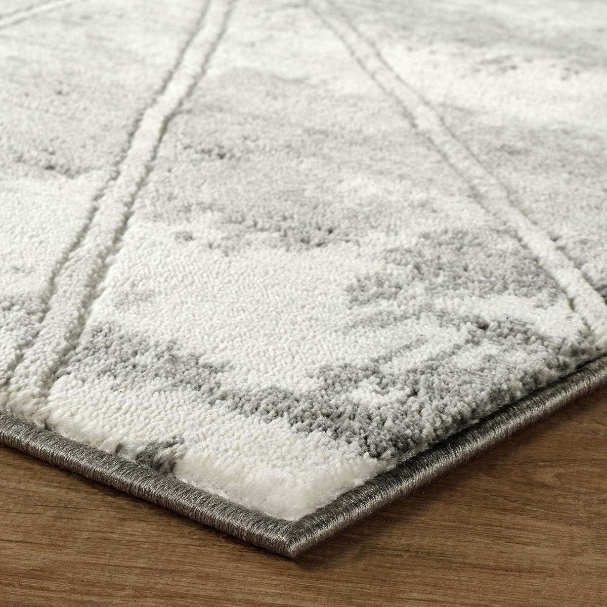 Grey Novu Mirage abstract rug, styled view 3