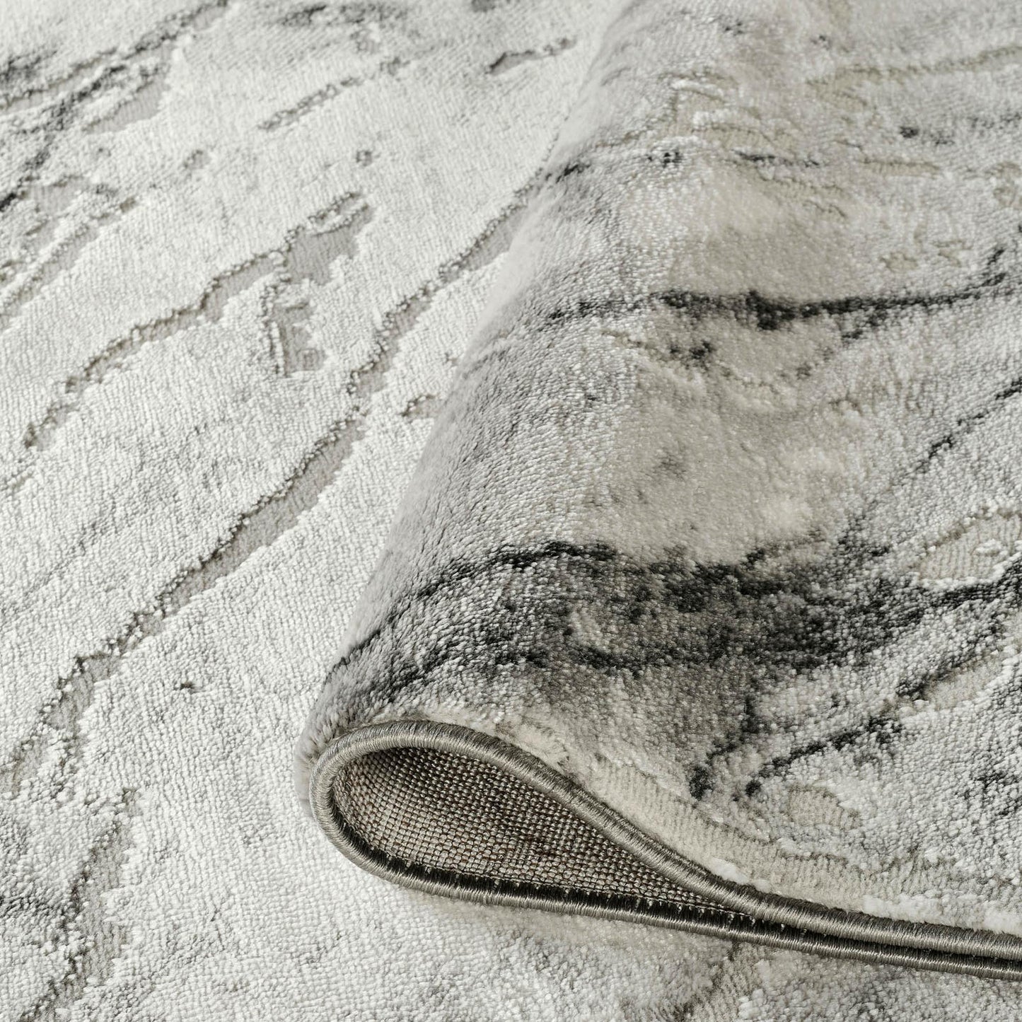 Grey Novu Valley abstract rug, styled view 3