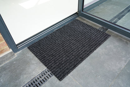 Anthracite Trapper Lines barrier mat, styled view
