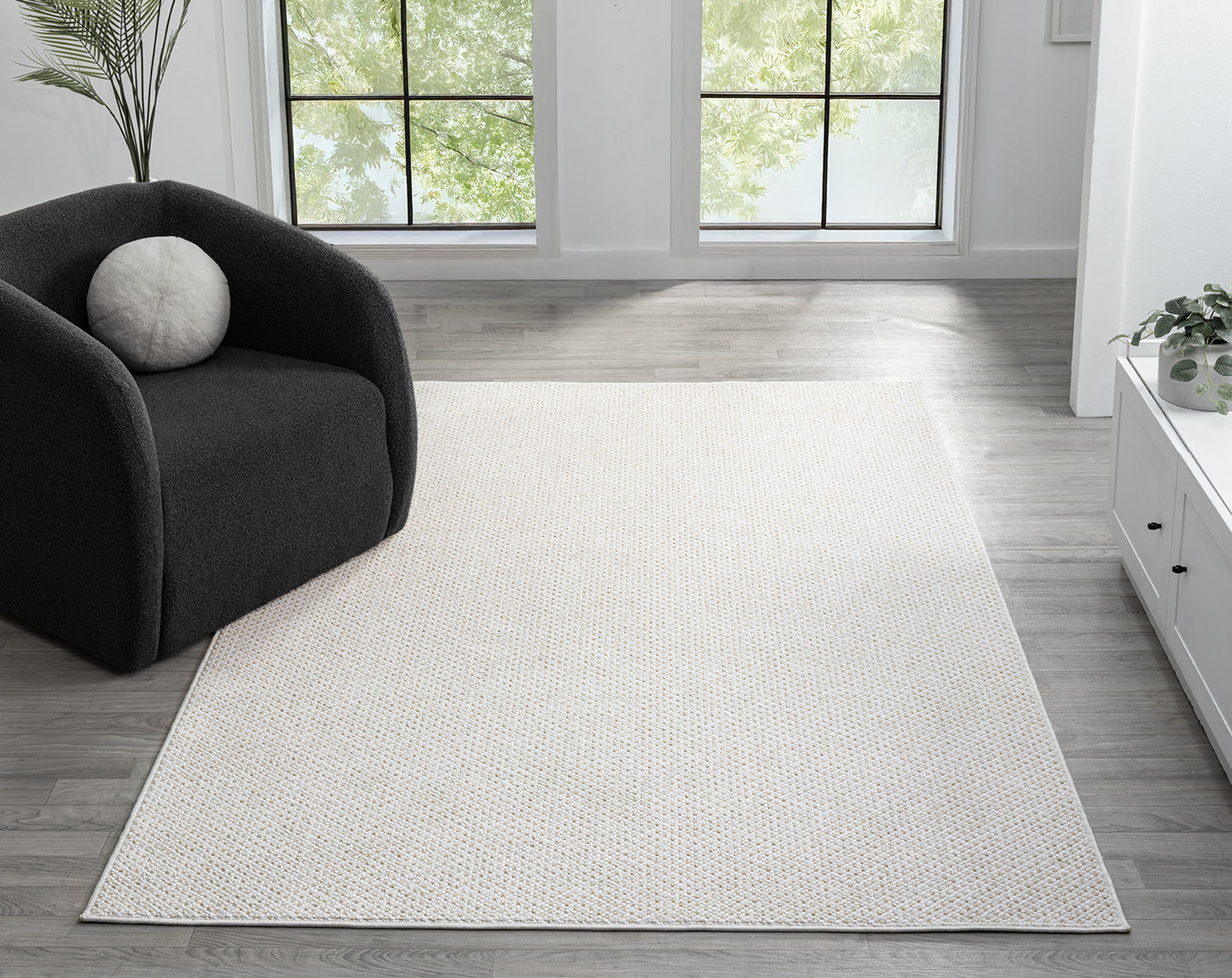 Cream Avior Mottle bobble rug, in a room setting 2