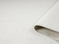 Cream Avior bobble rug, rolled view