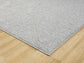 Grey Avior bobble rug, corner fold detail