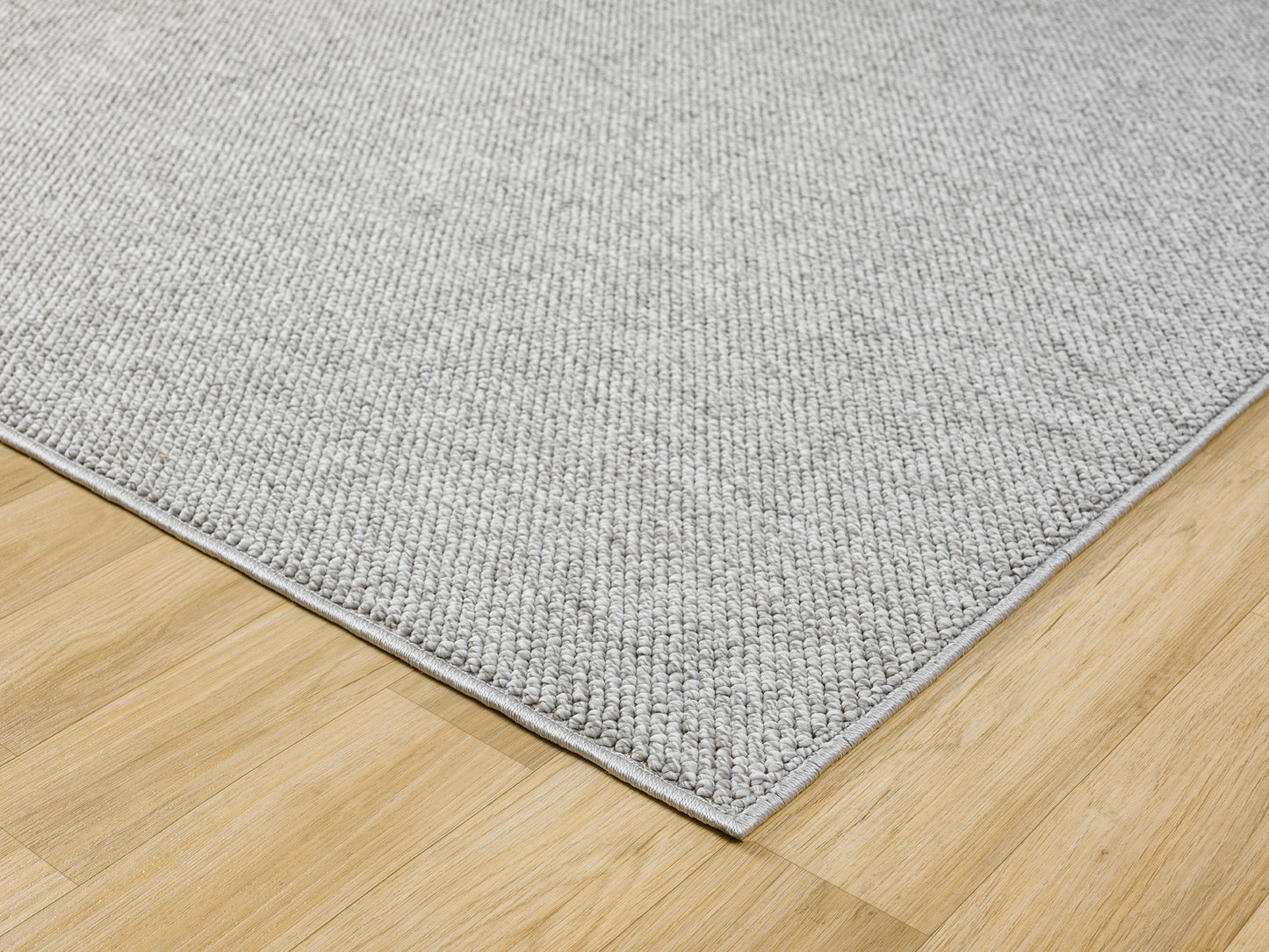 Grey Avior bobble rug, corner fold detail