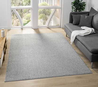 Grey Avior bobble rug, in a room setting