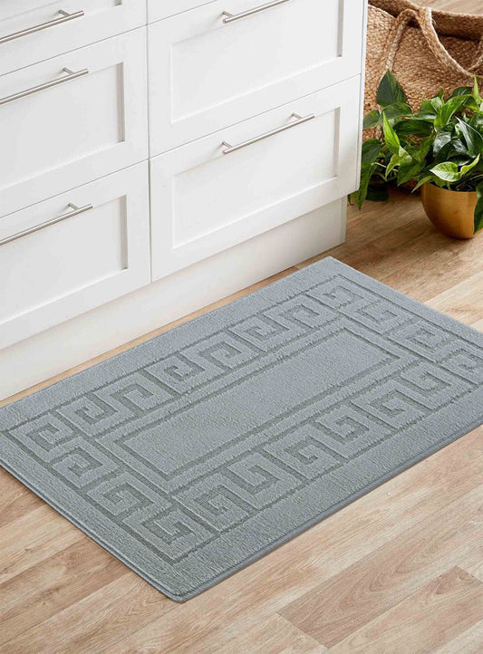 Dark Grey Ivy Greek Key door mat, in a room setting