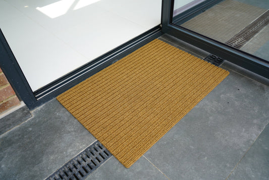 Beige Trapper Lines barrier mat, styled view