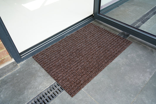 Brown Trapper Lines barrier mat, styled view