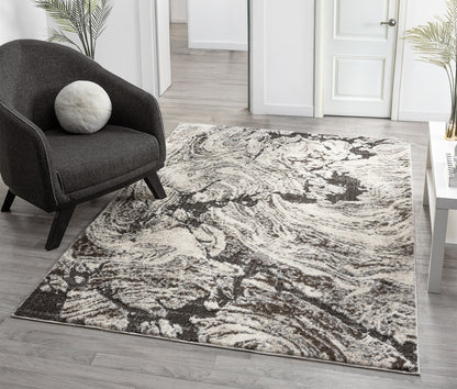 Grey Eleanor Astro embossed abstract rug, in a room setting