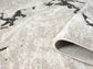 Mocha Eleanor Astro embossed abstract rug, rolled view