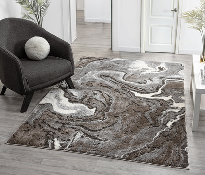 Grey Eleanor Marble embossed abstract rug, in a room setting