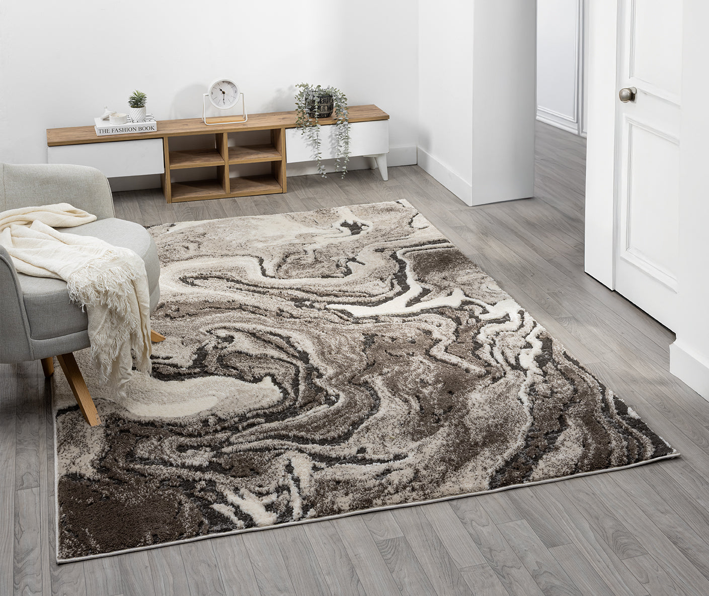 Mocha Eleanor Marble embossed abstract rug, in a room setting