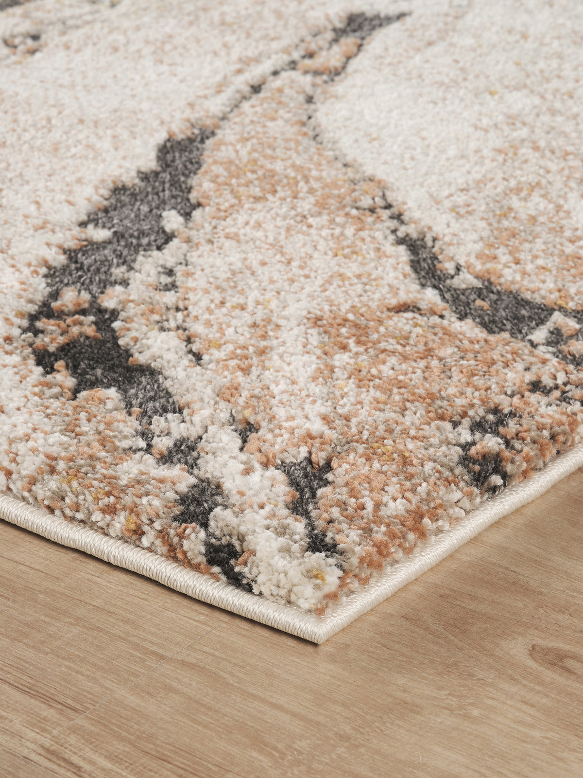 Terracotta Essence Lava textured abstract rug, close-up pile detail 2