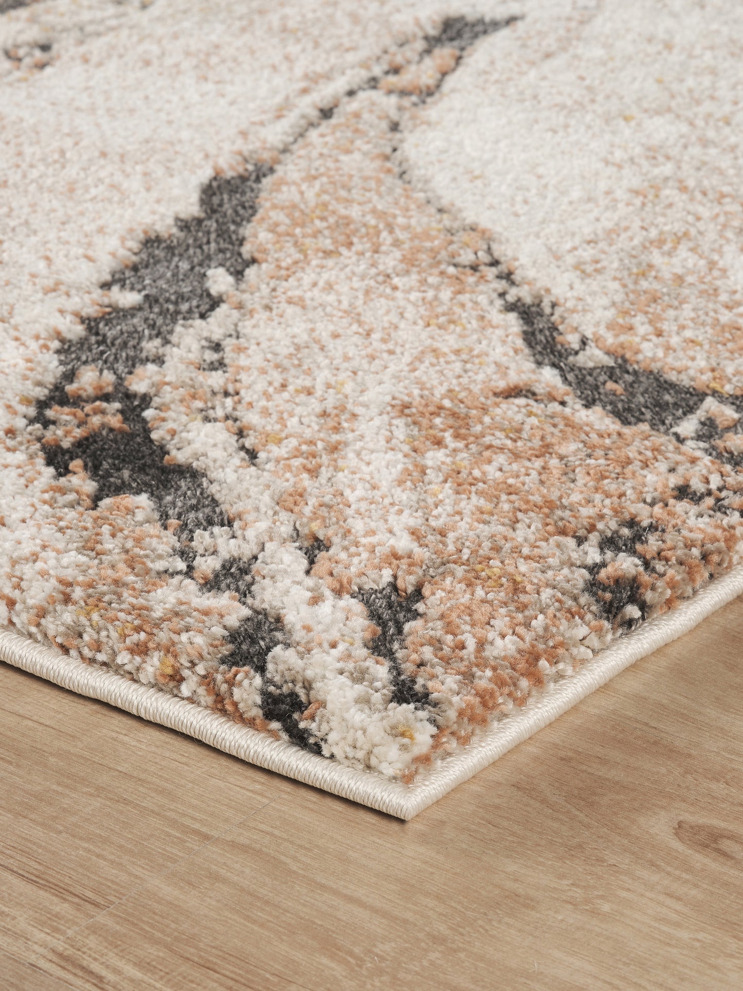 Terracotta Essence Lava textured abstract rug, close-up pile detail 2