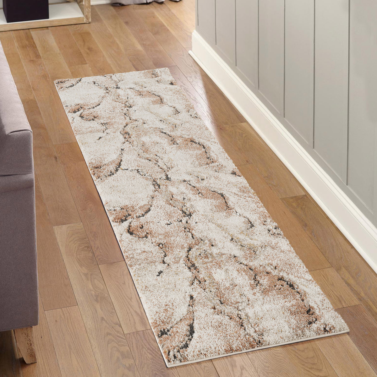 Terracotta Essence Lava textured abstract rug, in a room setting 2