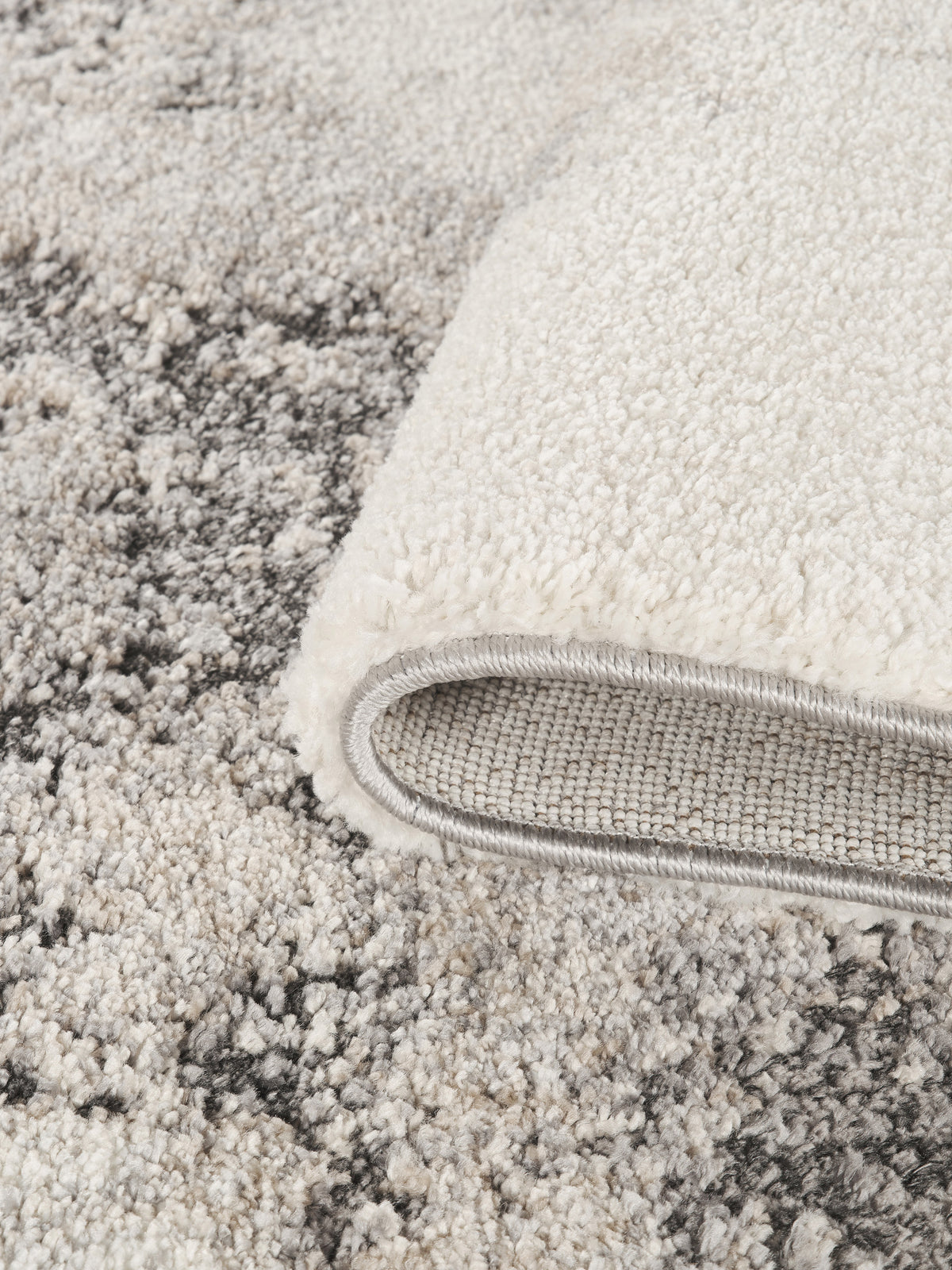 Grey Essence Nimbus textured abstract rug, close-up pile detail