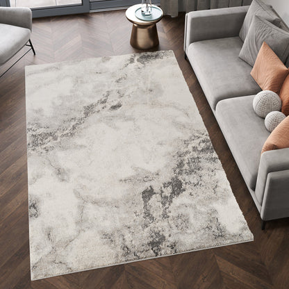 Grey Essence Nimbus textured abstract rug, in a room setting