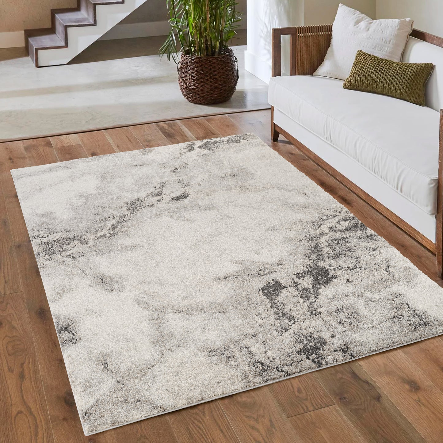 Grey Essence Nimbus textured abstract rug, in a room setting 3