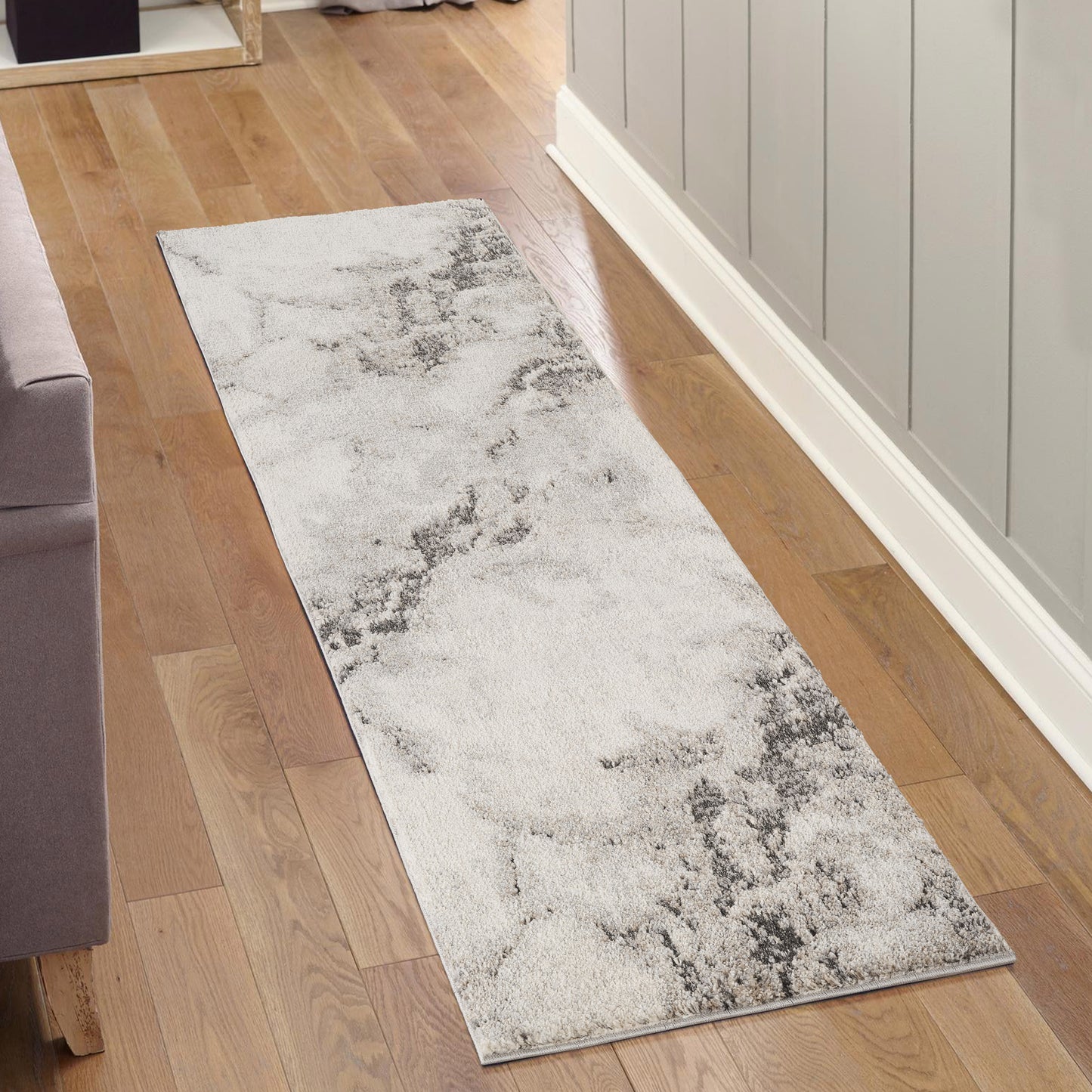 Grey Essence Nimbus textured abstract rug, in a room setting 2