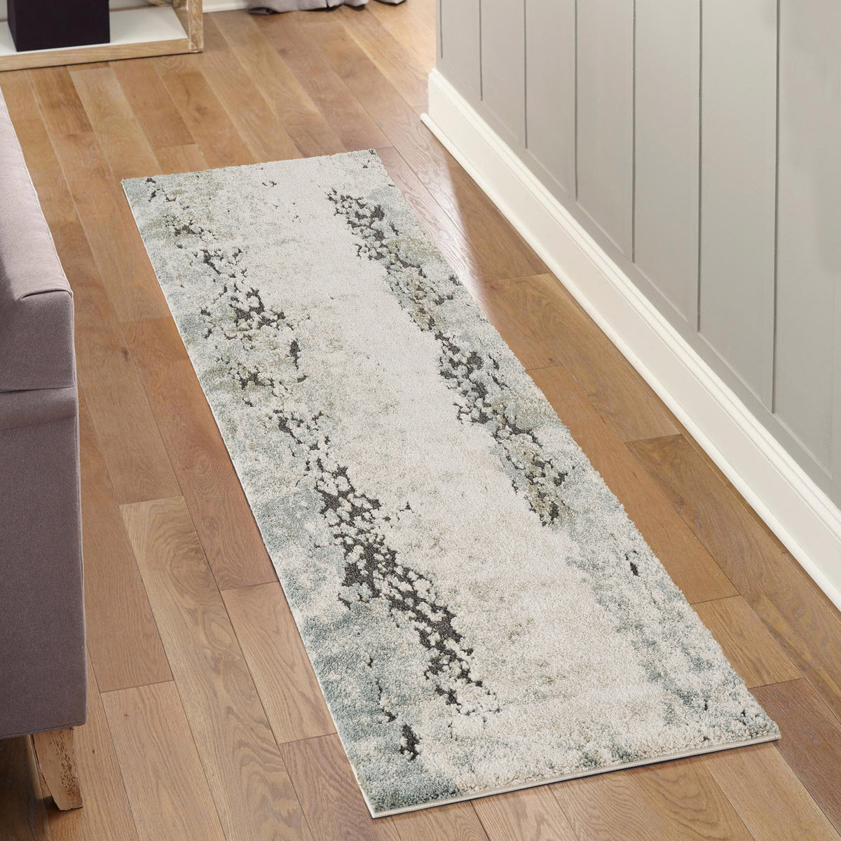 Sage Green Essence River textured abstract rug, in a room setting 2