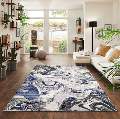 Navy Blue Emperor Solarius abstract rug, in a room setting