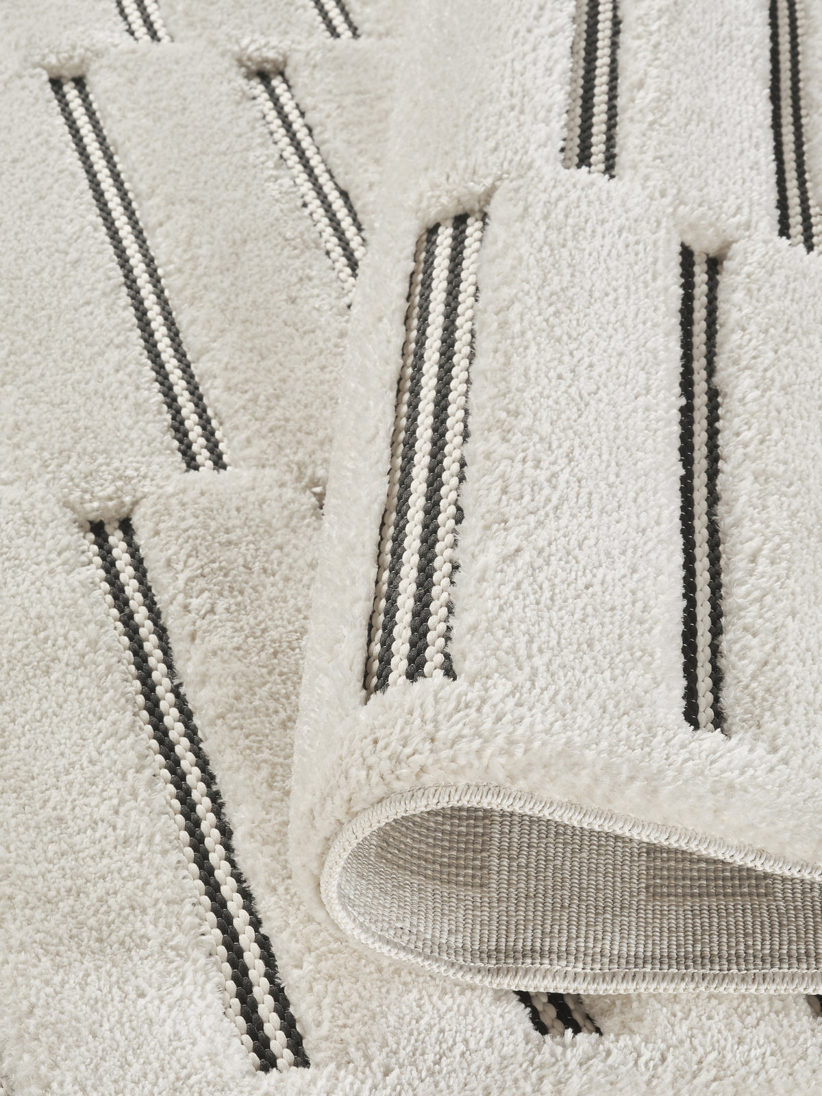 Cream Freya Bar embossed geometric rug, close-up pile detail