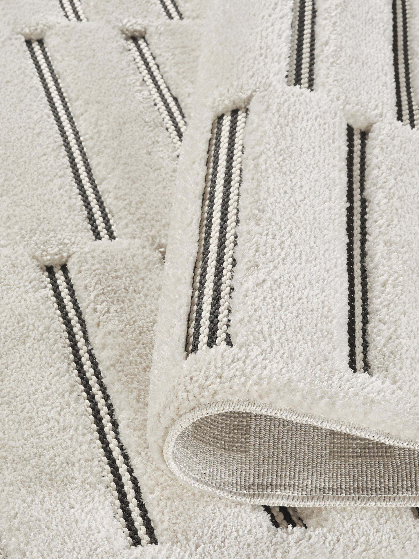 Cream Freya Bar embossed geometric rug, close-up pile detail