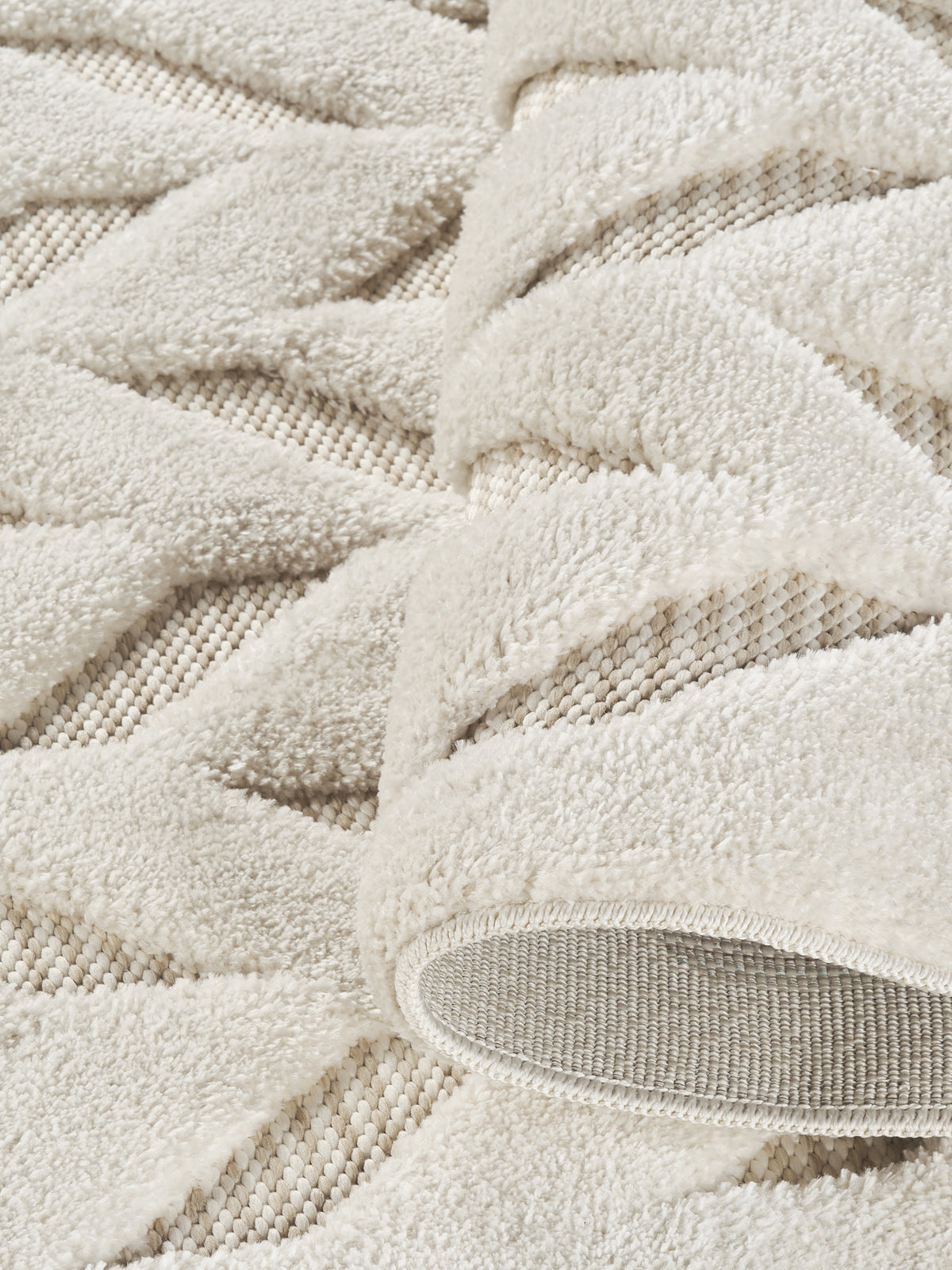 Cream Freya Herringbone embossed geometric rug, close-up pile detail