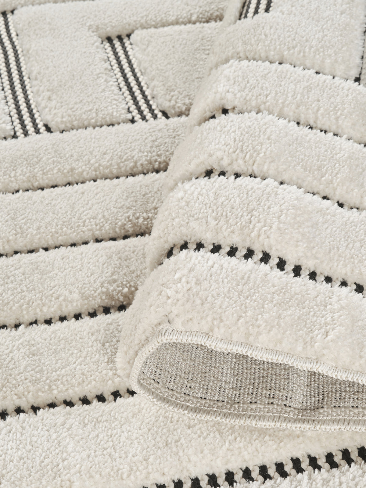 Cream Freya Merge embossed geometric rug, close-up pile detail