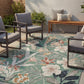 Sage Green Gardenia Lily floral rug, in a room setting 2