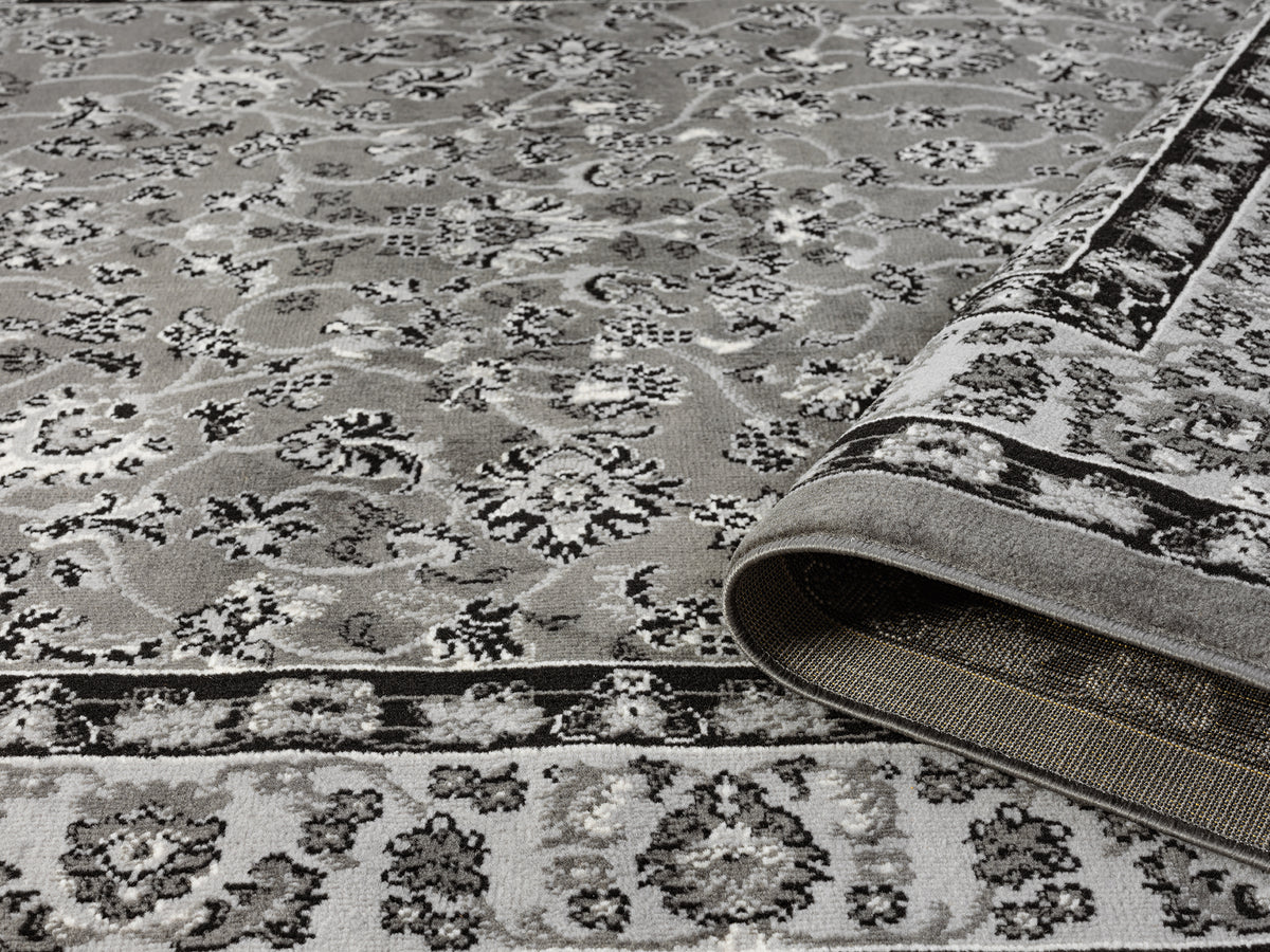 Grey Obsidian Classic monochrome rug, rolled view