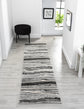Grey Obsidian Coast monochrome rug, in a room setting 3