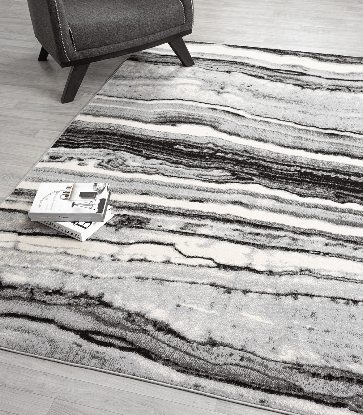 Grey Obsidian Coast monochrome rug, in a room setting 2