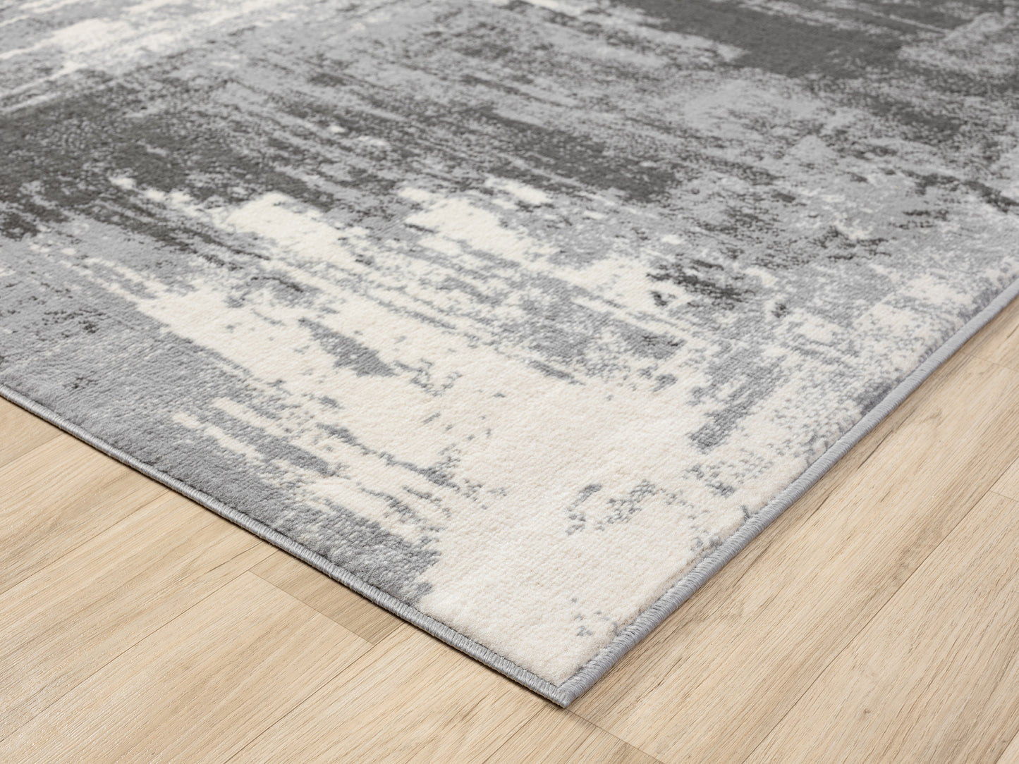 Grey Obsidian Craft monochrome rug, corner fold detail