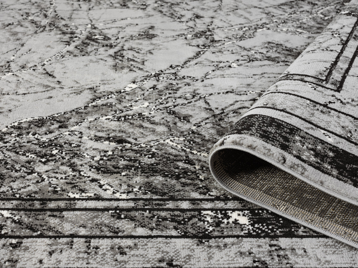 Grey Obsidian Frame monochrome rug, rolled view