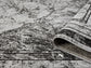 Grey Obsidian Frame monochrome rug, rolled view