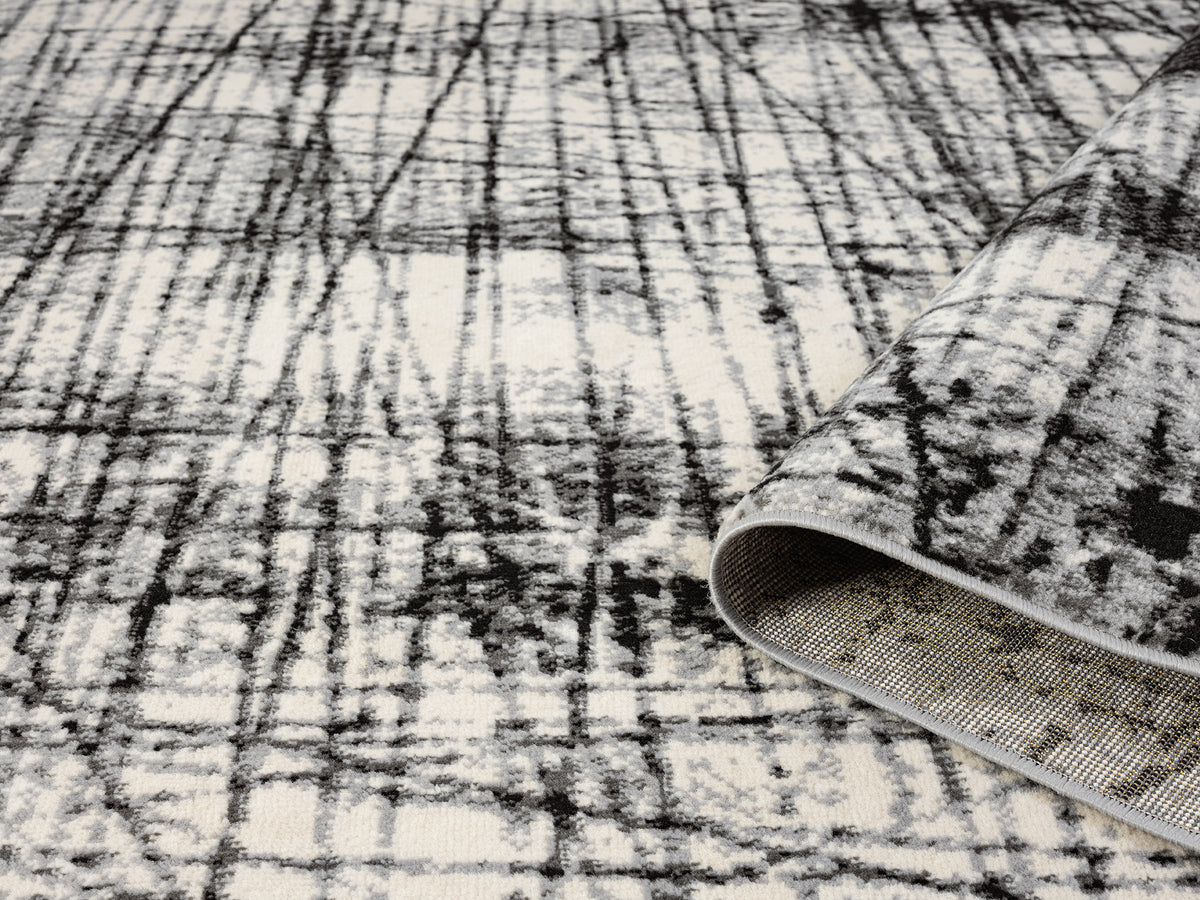 Grey Obsidian Oblique monochrome rug, rolled view