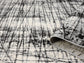 Grey Obsidian Oblique monochrome rug, rolled view