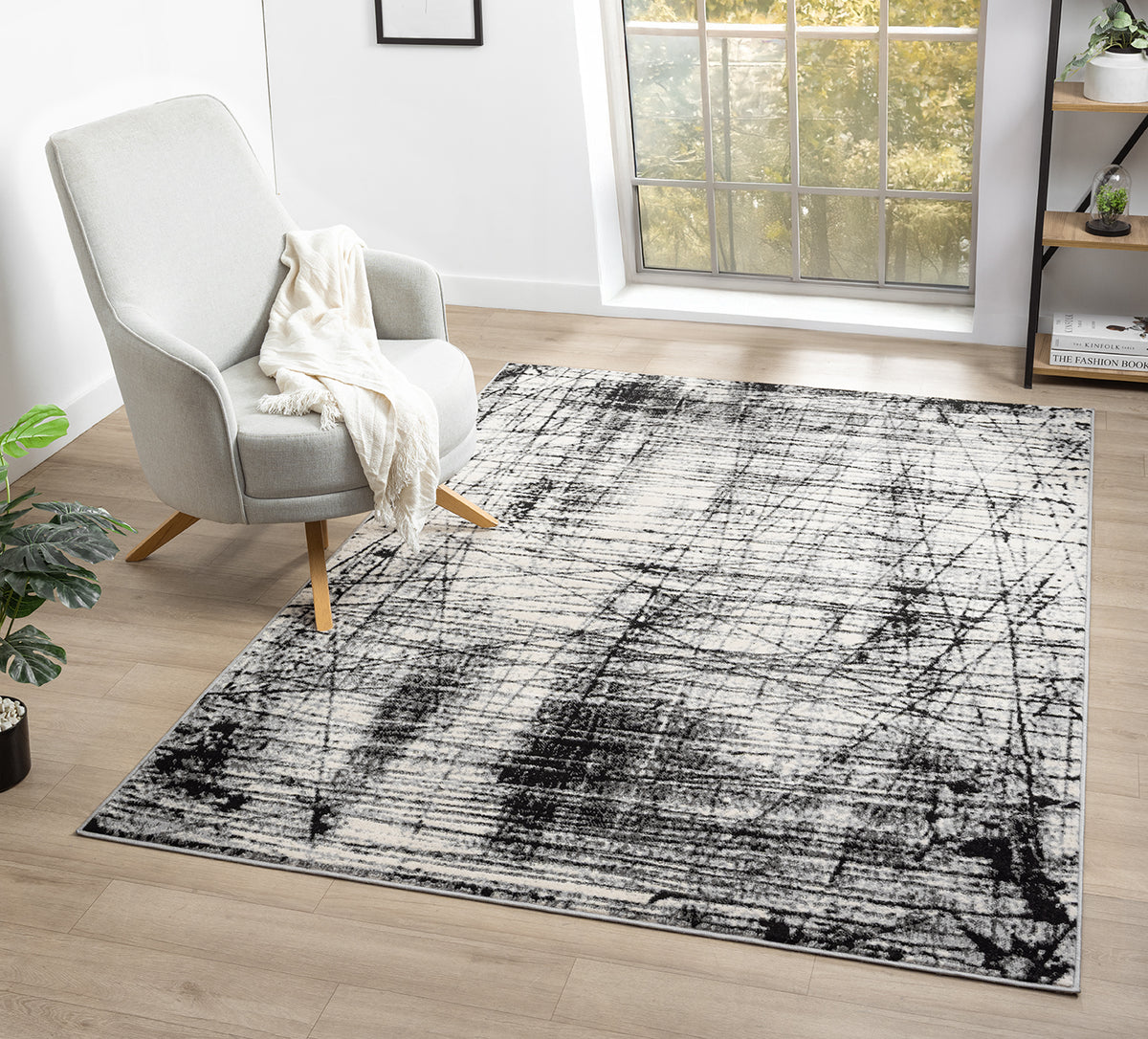 Grey Obsidian Oblique monochrome rug, in a room setting