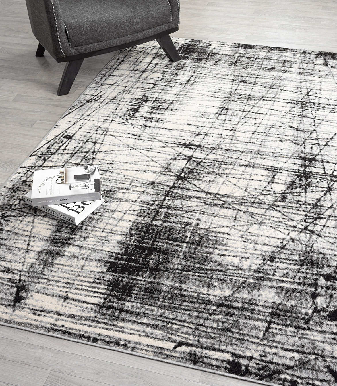 Grey Obsidian Oblique monochrome rug, in a room setting 2