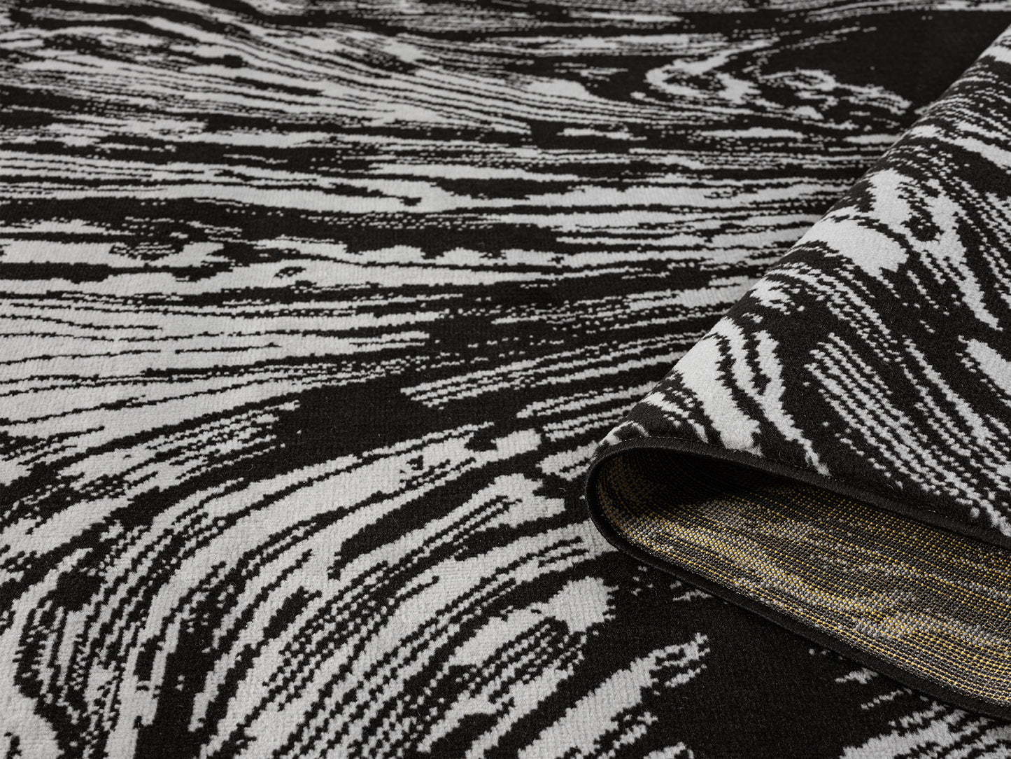 Grey Obsidian Whirlpool monochrome rug, rolled view