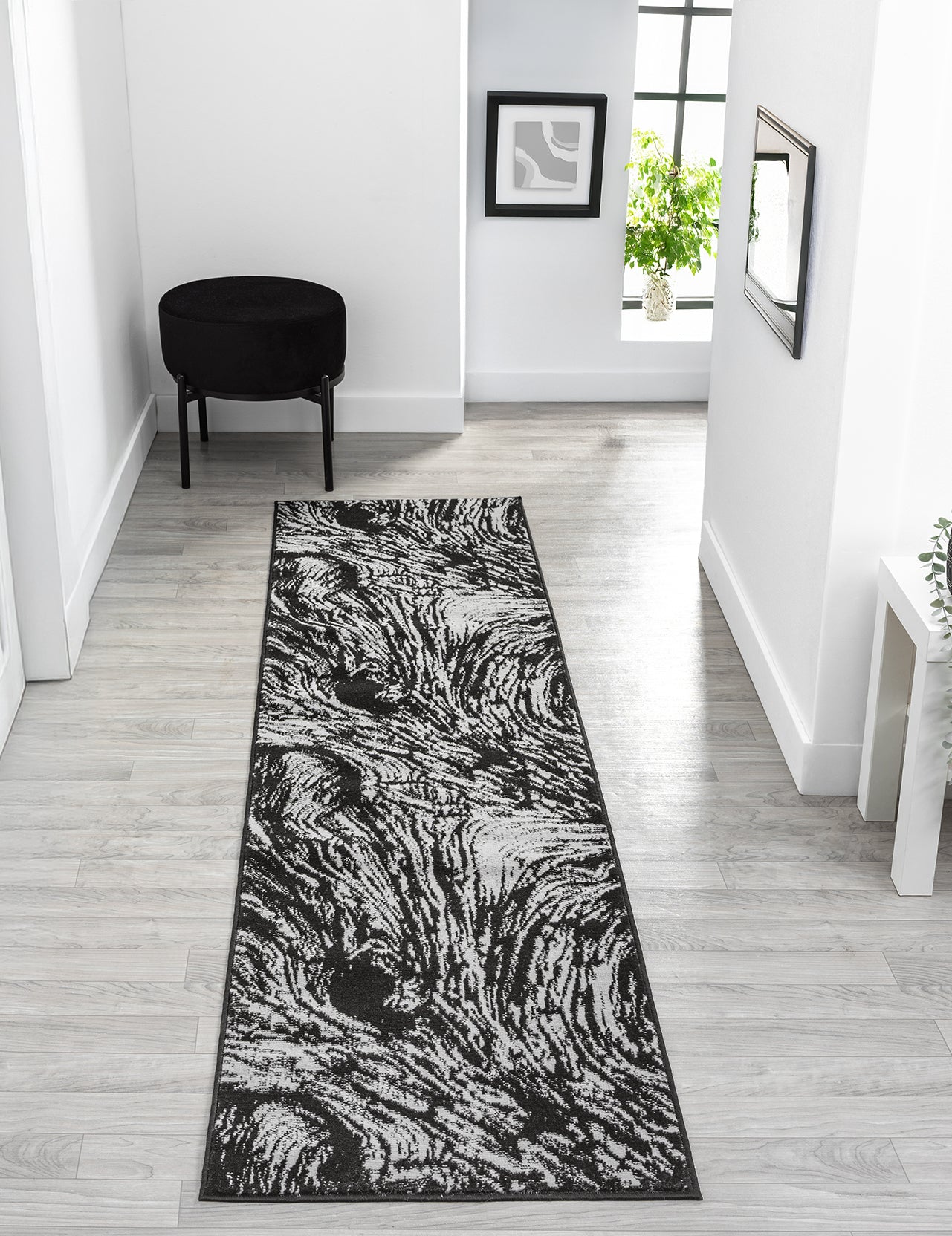 Grey Obsidian Whirlpool monochrome rug, in a room setting 3