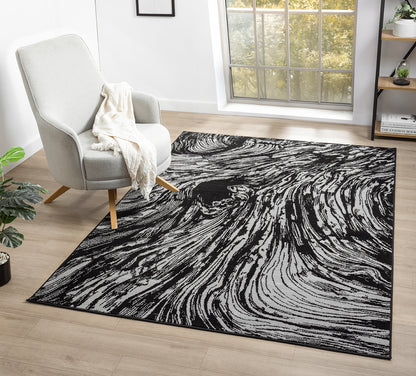 Grey Obsidian Whirlpool monochrome rug, in a room setting
