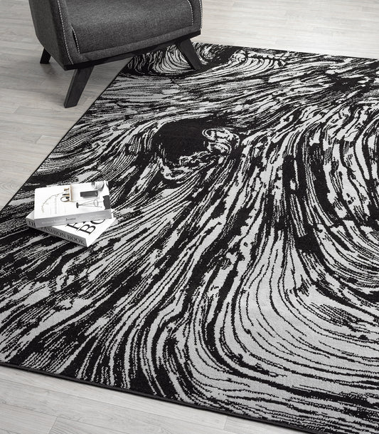 Grey Obsidian Whirlpool monochrome rug, in a room setting 2